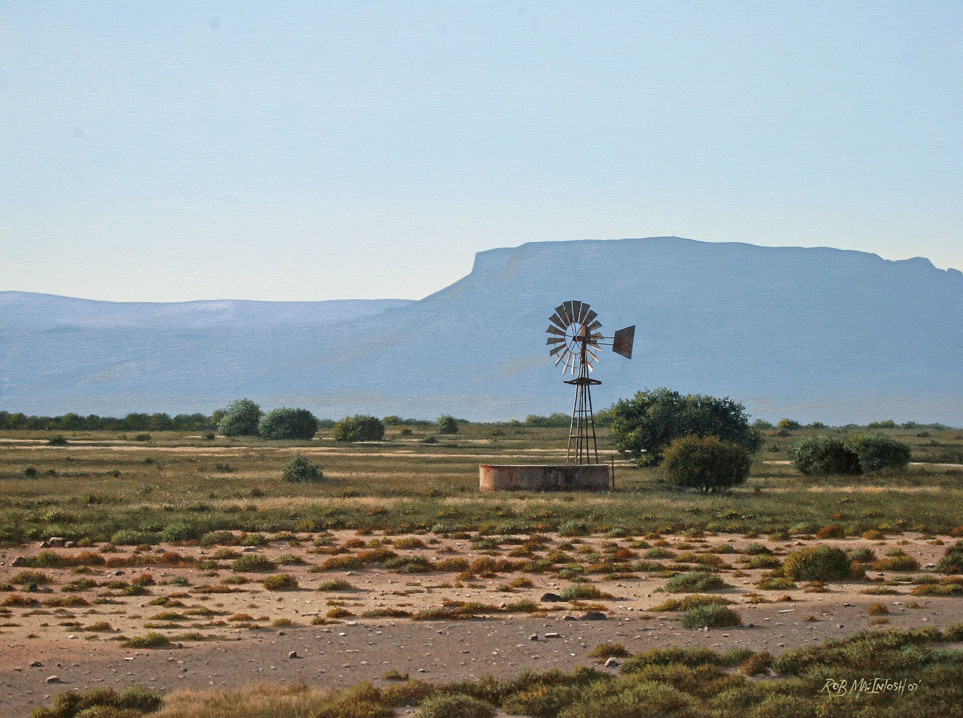 Photorealistic painting of an old windmill with a mountain range in the background