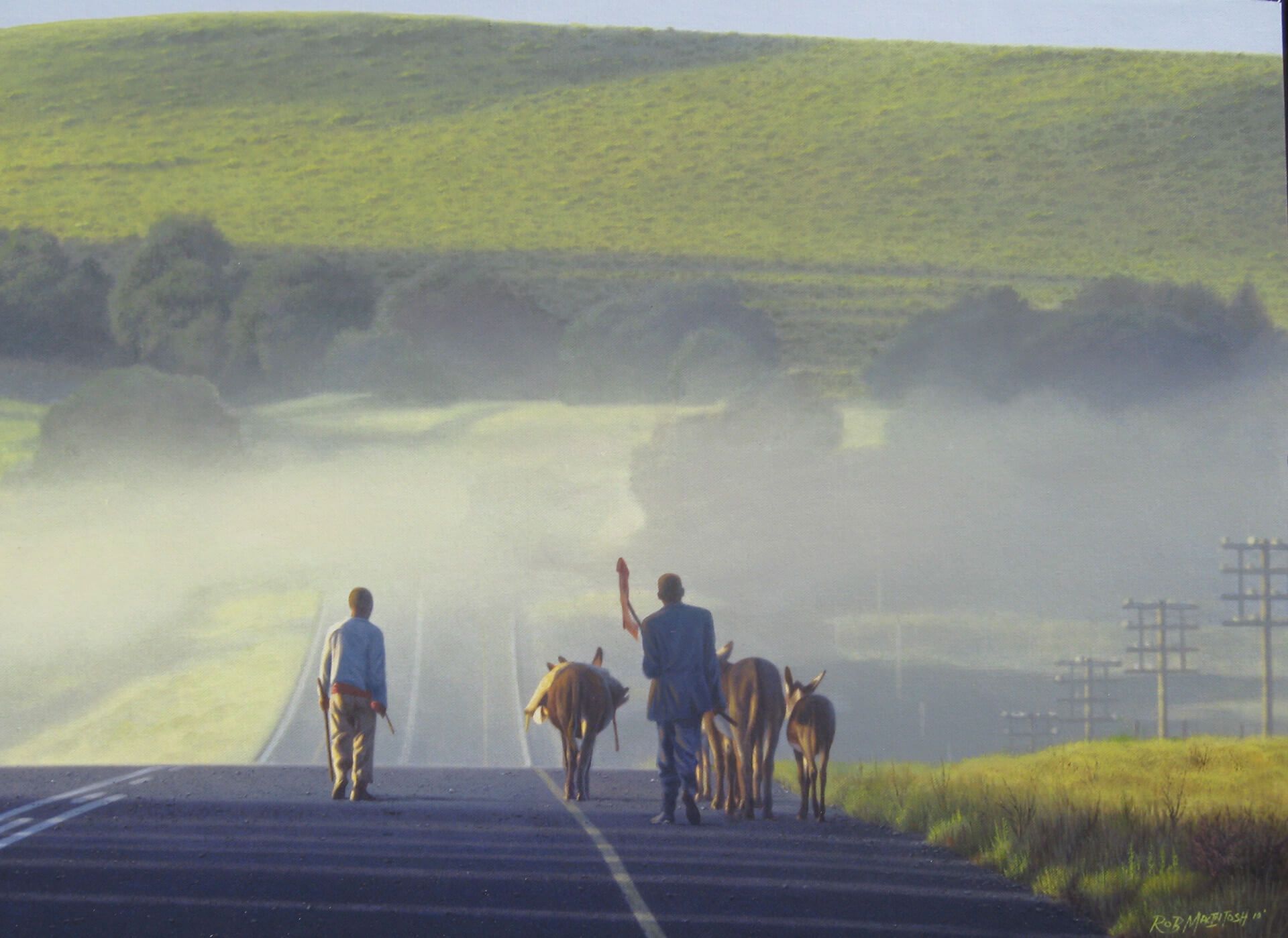 Family driving group of cattle down the road
